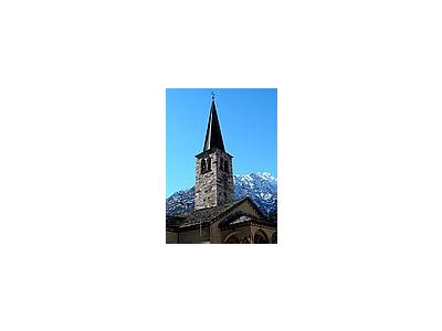 Photo Small Church Tower With Mountain In Background Building