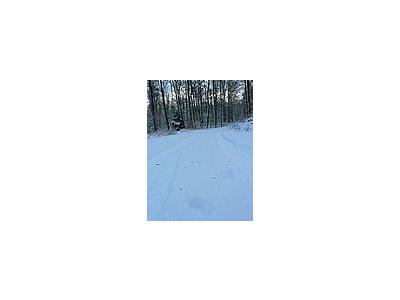 Photo Small Tracks In The Snow Landscape