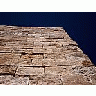 Photo Small Stone Wall Building title=